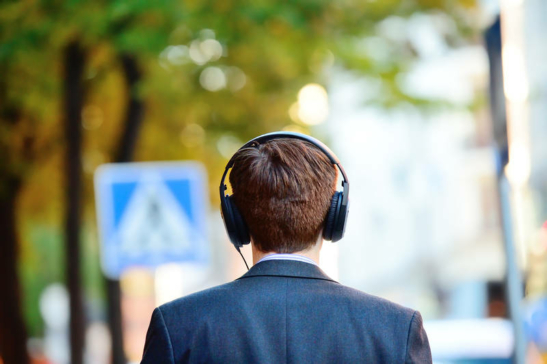 Head in silhouette with headphones